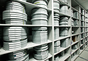 Shelves filled with film canisters at MDC's Wolfson Archives