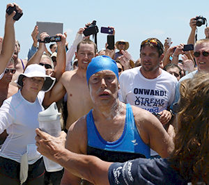 Diana Nyad steps onto Smathers Beach in Key West 