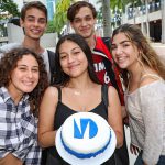 MDC students holding crafted cake