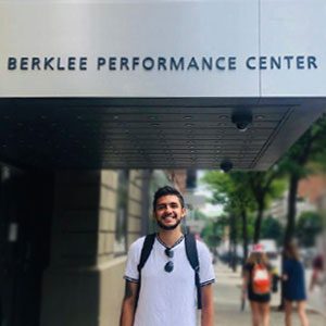 Mateo Suarez standing by Berklee Performance Center entrance