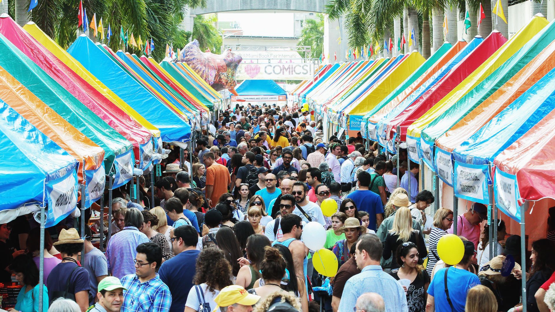 People and tents at the Miami Book Fair, Street Fair