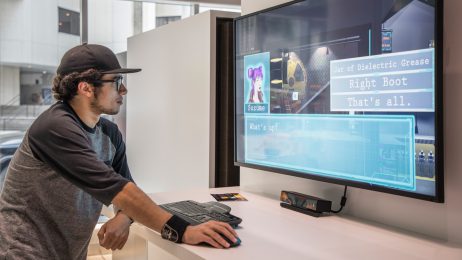 Young man tries out video game