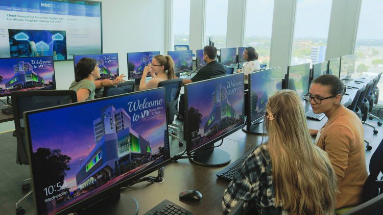 Students at computers at the new center