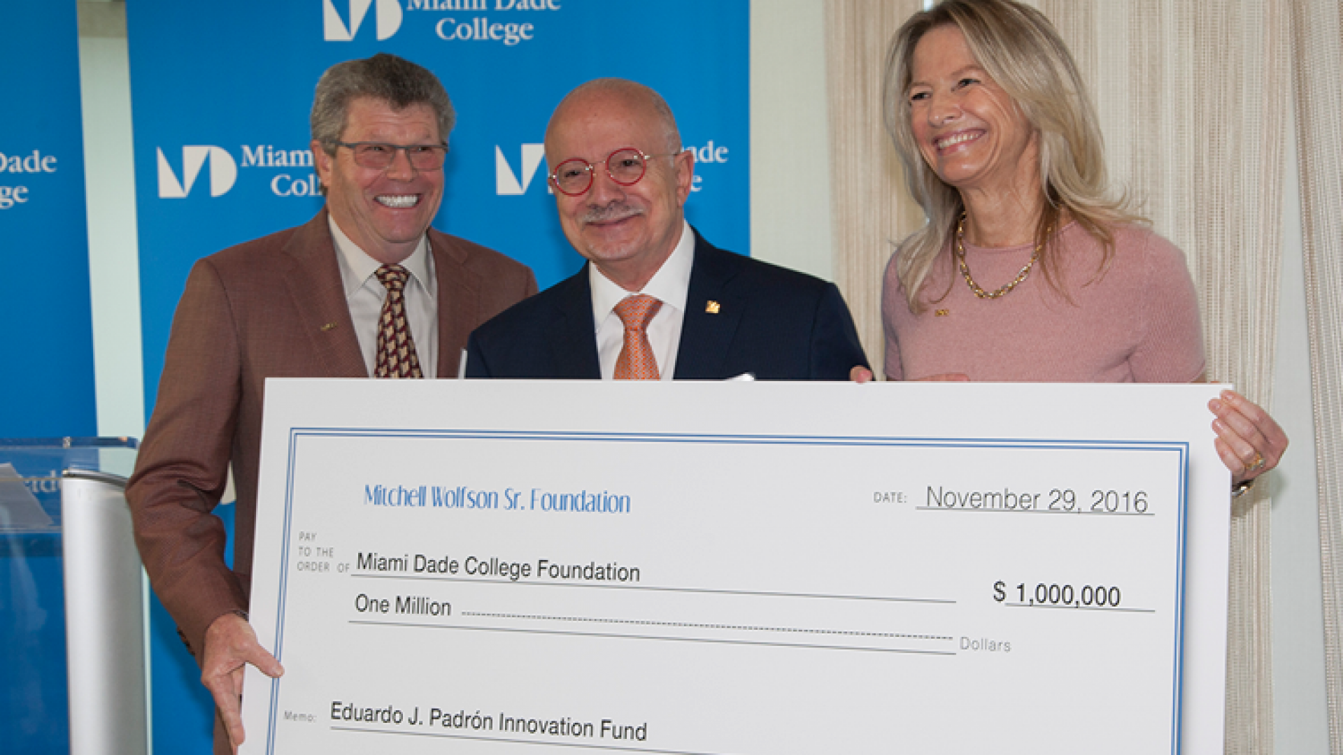 Dr. Eduardo J. Padrón receiving check from The Mitchell Wolfson Sr. Foundation