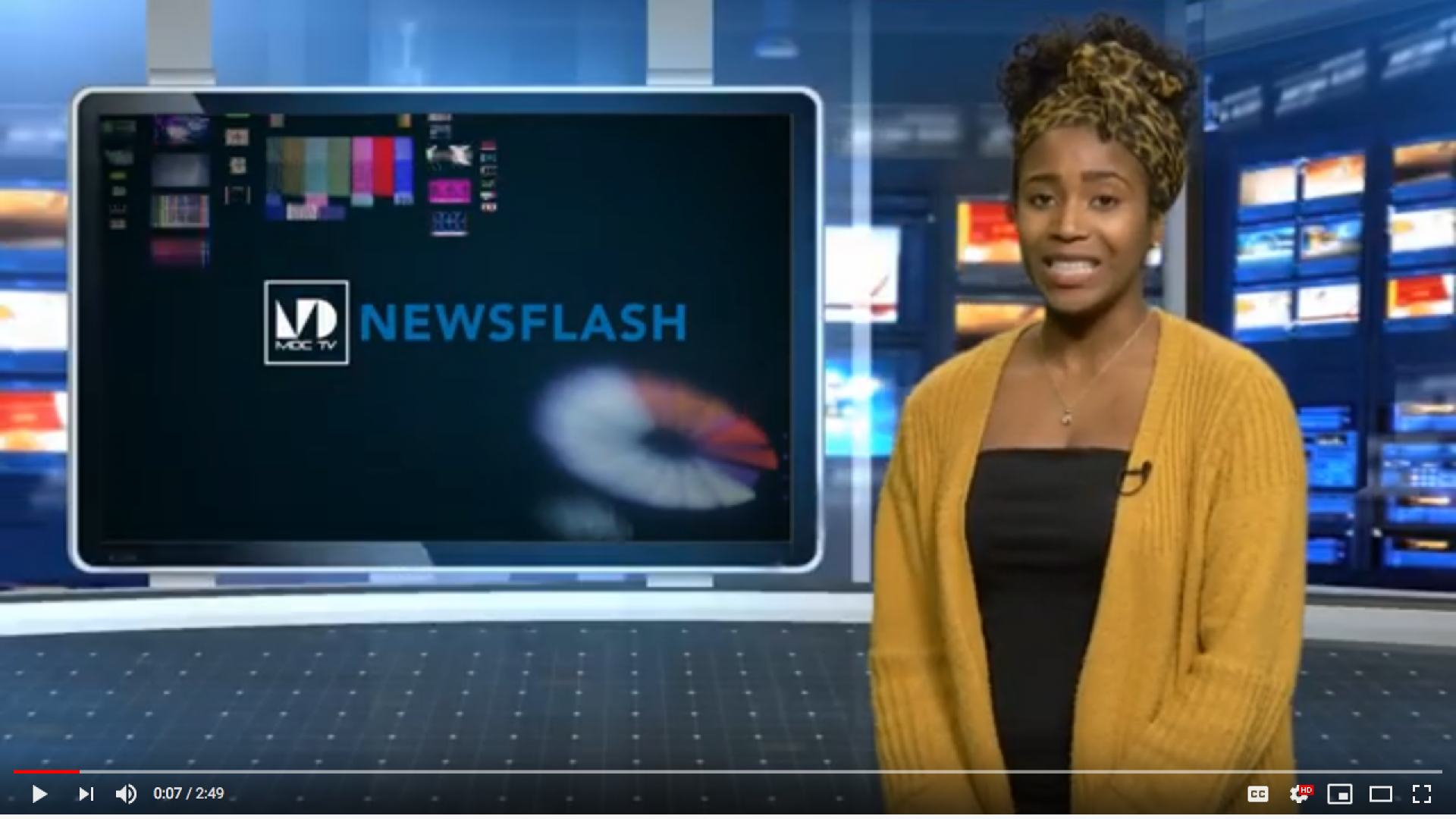 MDC News anchor on set