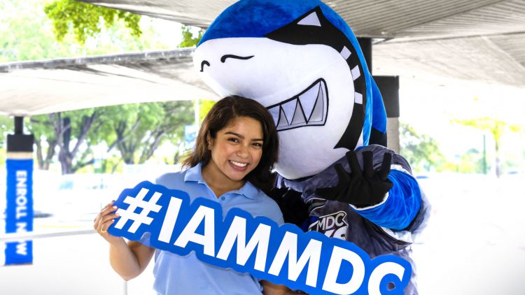 Finn with MDC student holding the hashtag sign #IAMMDC