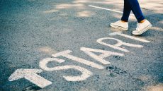 Woman's feet on pavement with