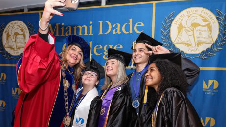 President Pumariega taking a selfie with top grads
