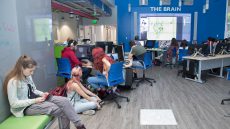 Students at MAGIC studio engaged in work