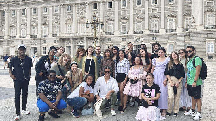 Group of NWSA college students posing with their teacher in front the Royal Palace, Madrid Spain